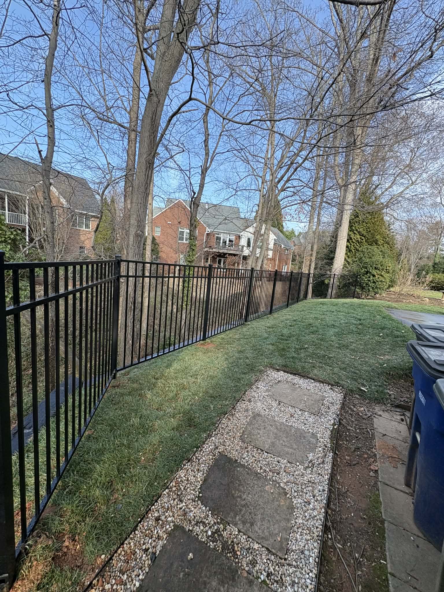 Full Landscape Renovation: Retaining Wall Replacement & Black Aluminum Fence Installation in Winston-Salem, NC